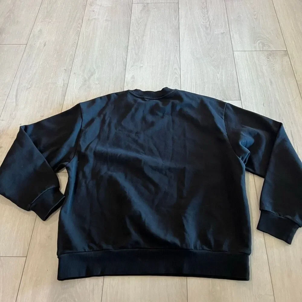 Skims women’s black sweater size M